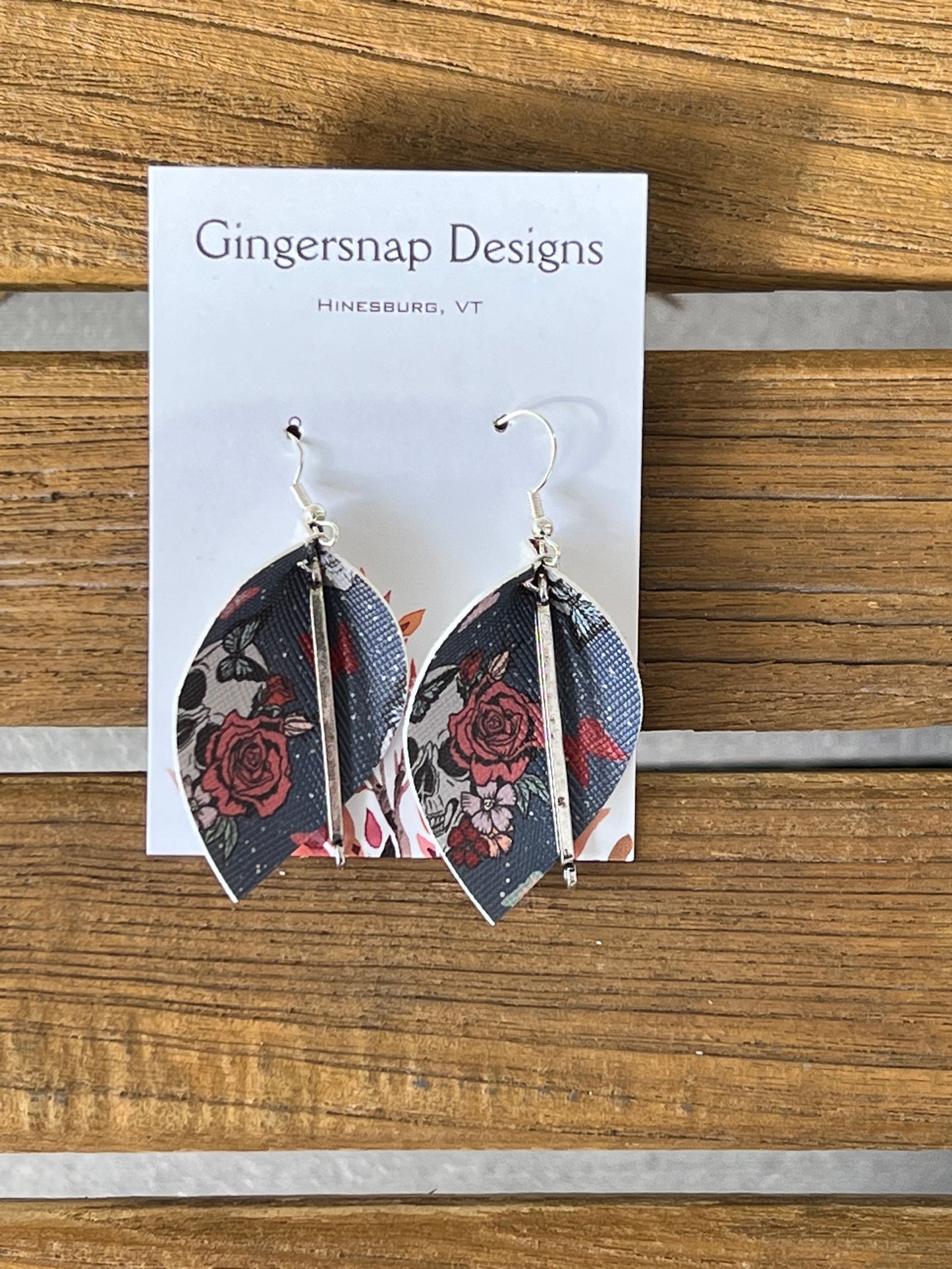 Small curved Halloween blue floral skulls